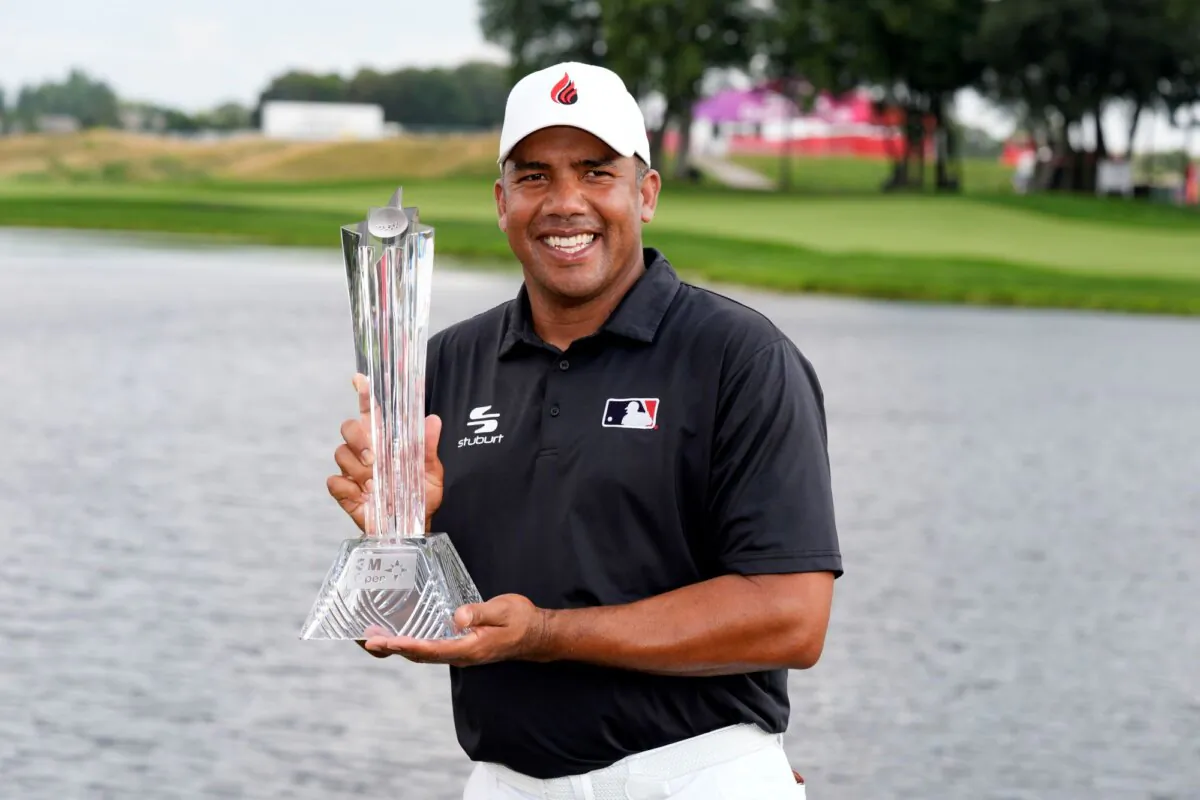 Jhonattan Vegas holds the trophy after winning the 3M Open golf tournament in Blaine, Minn., on July 28, 2024. (Charlie Neibergall/AP Photo)