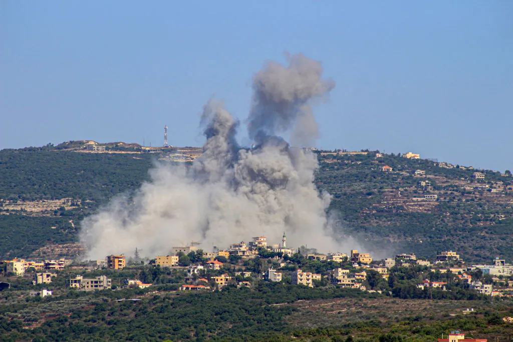 Smoke billows following an Israeli airstrike in the southern Lebanese border village of Chihine on July 28, 2024. (KAWNAT HAJU/AFP via Getty Images)
