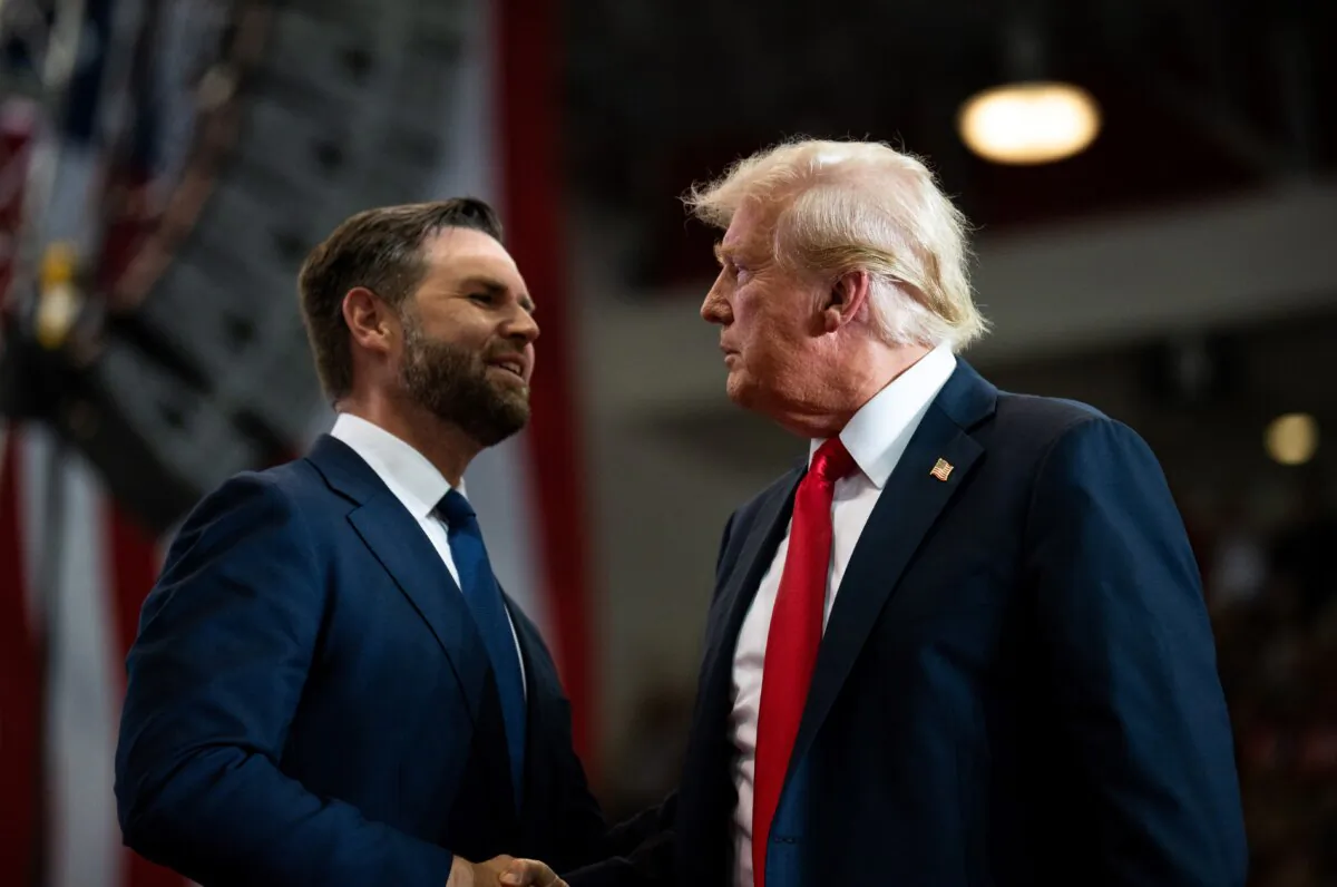 Republican vice presidential nominee U.S. Sen. J.D. Vance (R-Ohio) introduces U.S. Republican Presidential nominee former President Donald Trump during a rally at Herb Brooks National Hockey Center in St Cloud, Minn., on July 27, 2024. (Stephen Maturen/Getty Images)