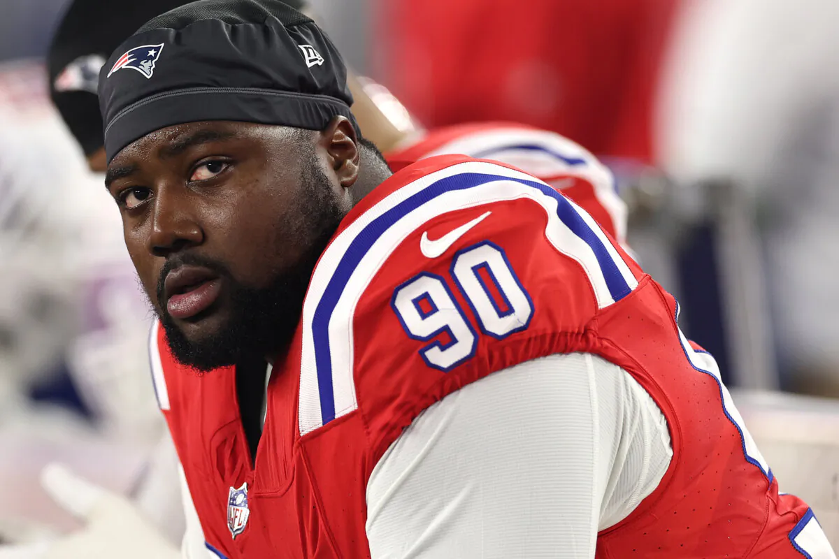 Christian Barmore #90 of the New England Patriots looks on from the bench during the game against the Miami Dolphins at Gillette Stadium in Foxborough, Massachusetts, on Sept. 17, 2023. (Maddie Meyer/Getty Images)