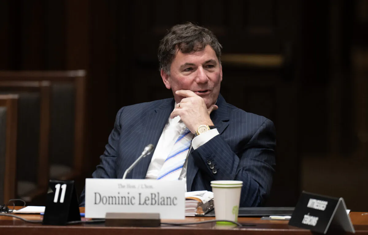 Minister of Public Safety, Democratic Institutions and Intergovernmental Affairs Dominic LeBlanc waits to appear at the Procedure and House Affairs committee, in Ottawa, on June 20, 2024. (The Canadian Press/Adrian Wyld)