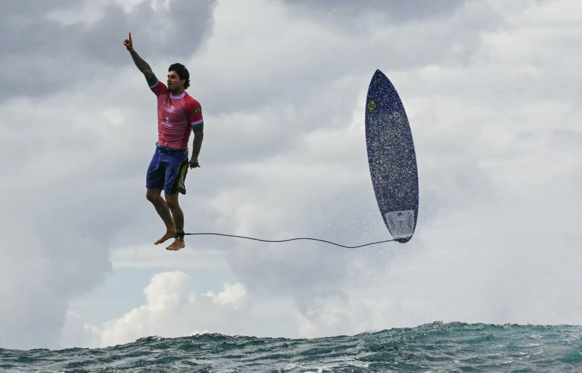 Brazil's Gabriel Medina reacts after getting a large wave in the 5th heat of the men's surfing round 3, during the Paris 2024 Olympic Games, in Teahupo'o, on the French Polynesian Island of Tahiti, on July 29, 2024. (Jerome Brouillet/ AFP via Getty Images)