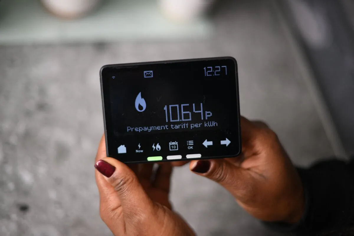Samantha Pierre-Joseph shows her smart meter indicating that she is on a "prepayment tariff," in her house in London, on Dec. 13, 2022. (Daniel Leal/AFP via Getty Images)