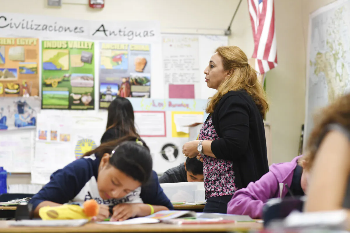 Instructor Blanca Claudio teaches a history lesson in Spanish in a Dual Language Academy class at Franklin High School in Los Angeles on May 25, 2017. (Robyn Beck/AFP/Getty Images)
