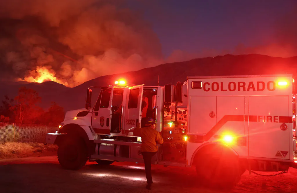 A firefighter works as the Nixon Fire burns with evacuation orders in the area, near Aguanga of Riverside County, Calif., on July 29, 2024. (Mario Tama/Getty Images)