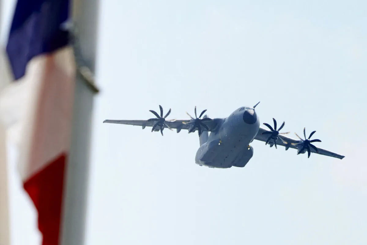 A French Air and Space Force A400M transport aircraft flies over the Tokorozawa Aviation Memorial Park, near the Japan Air Self-Defense Force (JASDF) Iruma Air Base in Saitama prefecture on July 28, 2023. (Kazuhiro Nogi/AFP via Getty Images)