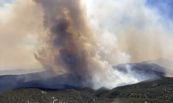 1 Person Killed in Colorado Wildfires as Blazes Torch Large Areas of the US West