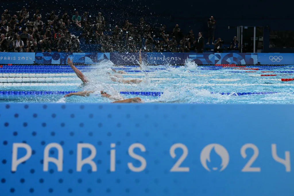 Swimmers compete in the semifinal of the men's 200m backstroke swimming event during the Paris 2024 Olympic Games at the Paris La Defense Arena in Nanterre, west of Paris, on July 31, 2024. (Jonathan Nackstrand/AFP via Getty Images)