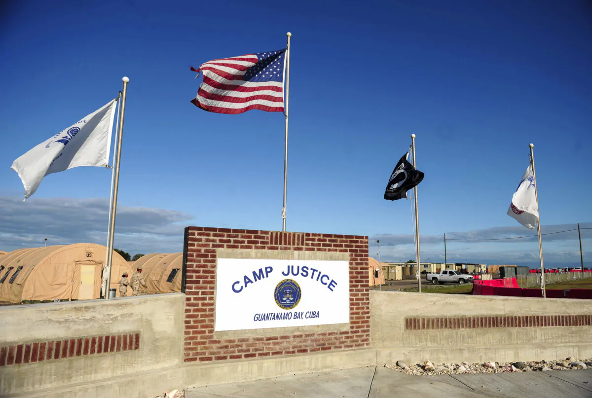An image released by the U.S. military on July 16, 2009, shows a 'Camp Justice' sign near the high-security courtroom in Guantanamo Bay, Cuba, where the pre-trial sessions for Khalid Sheikh Mohammed and his four co-defendants, charged for the 9/11 attacks, will be held. (Mandel Ngan-Pool/Getty Images)