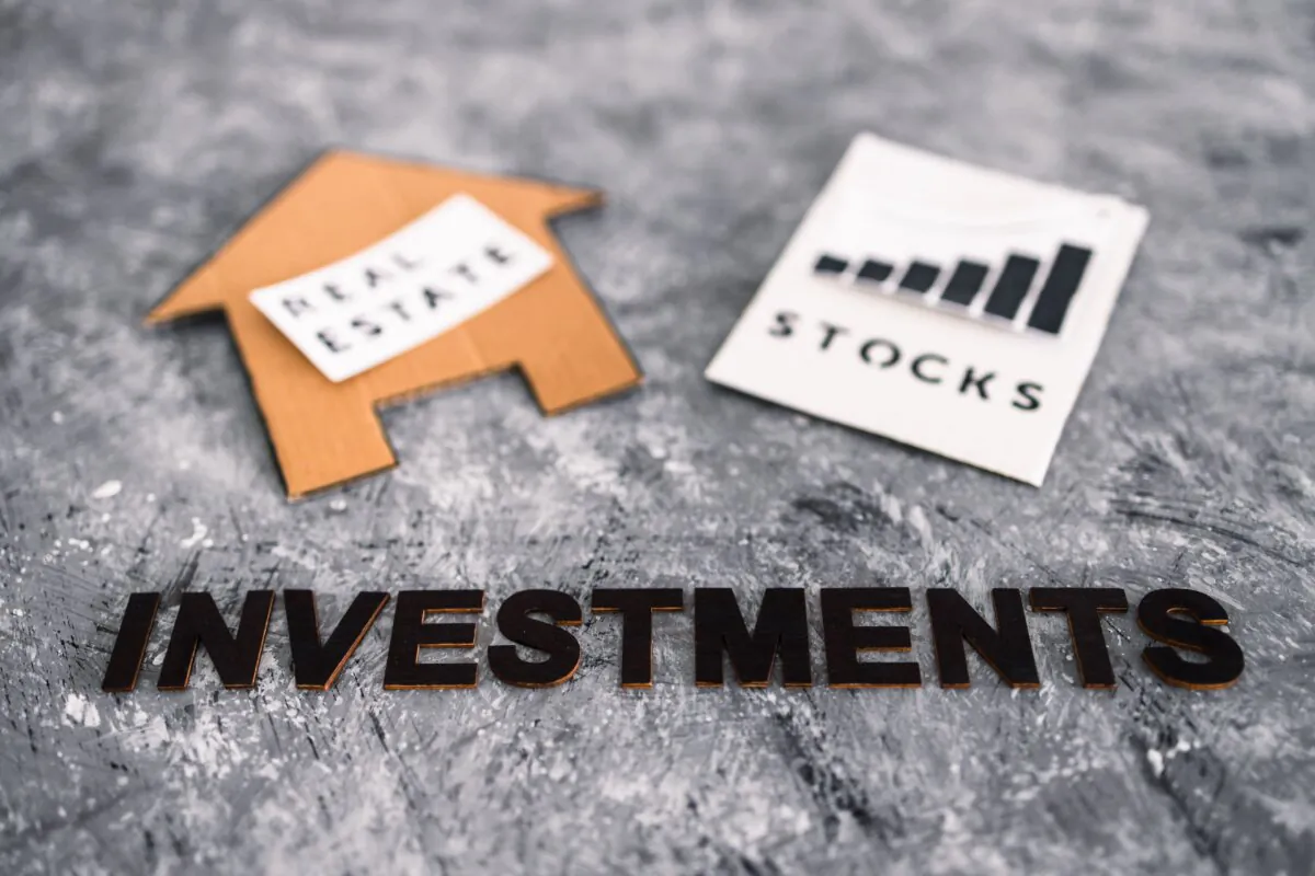 Income-producing real estate, businesses, and stocks are key to building wealth. (Faithie/Shutterstock)