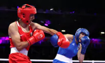 Algerian Boxer Who Previously Failed Gender Eligibility Criteria Wins Olympic Match After Opponent Quits