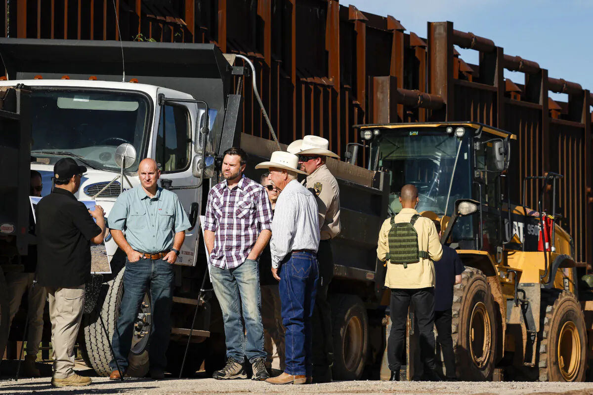 Republican vice presidential nominee Sen. JD Vance (R-Ohio) talks to local law enforcement, border patrol officials, and local ranchers as he tours the U.S. border wall in Montezuma Pass, Ariz., on Aug. 01, 2024. (Anna Moneymaker/Getty Images)