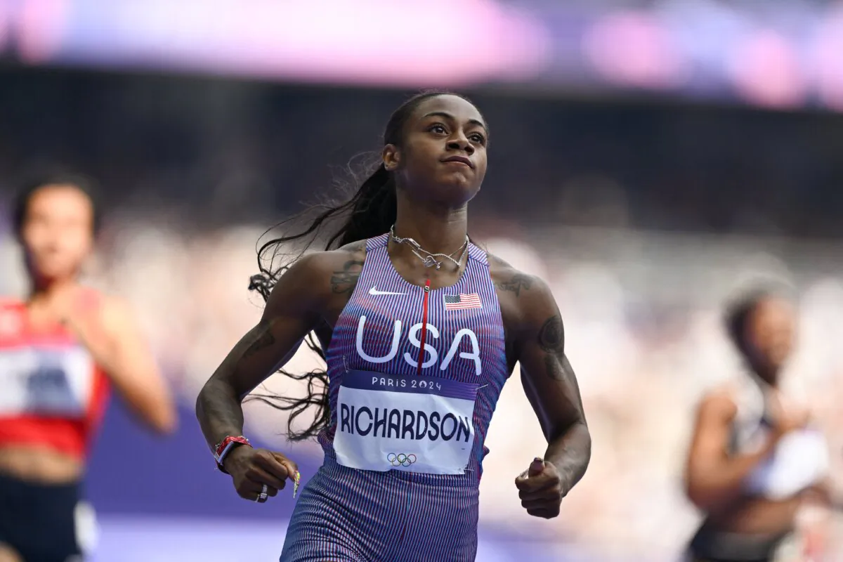 Sha'carri Richardson of Team United States of America competes during the Women's 100m Round 1 - Heat 1 on day seven of the Olympic Games Paris 2024 at Stade de France in Paris on August 2, 2024. (Hannah Peters/Getty Images)