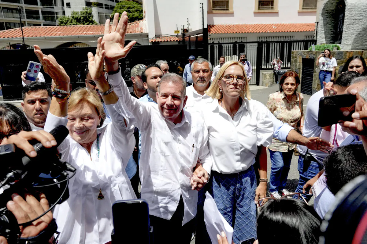 Venezuelan opposition presidential candidate Edmundo González gestures as he arrives at a polling station to vote in the country's presidential election, in Caracas, Venezuela, on July 28, 2024. (Alexandre Meneghini/Reuters)