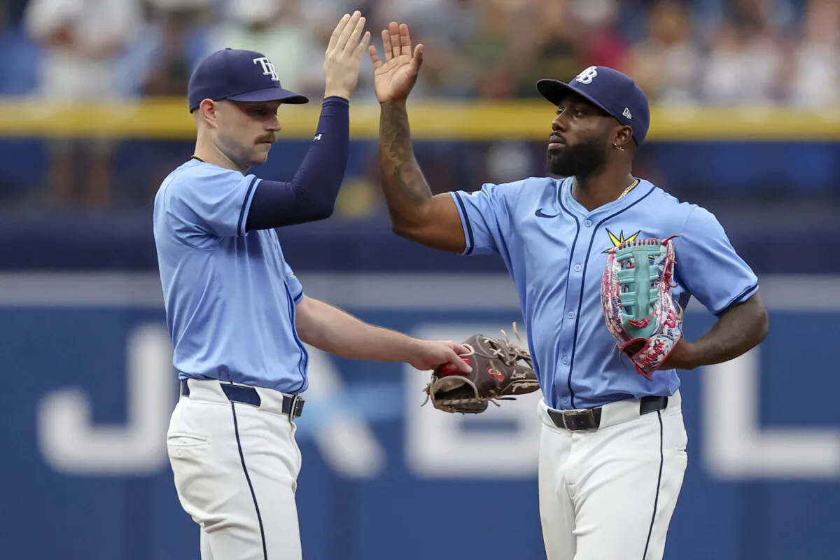 Tampa Bay Rays' Brandon Lowe (L) celebrates win over the Kansas City Royals with Randy Arozarena in a baseball game in St. Petersburg, Fla., on May 26, 2024. (Mike Carlson/AP Photo)