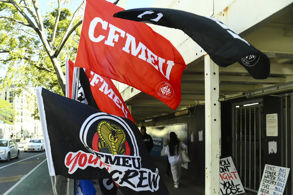 Construction, Forestry, Maritime, Mining and Energy Union (CFMEU) signs in Brisbane, Australia on July 16, 2024. (AAP Image/Jono Searle) 
