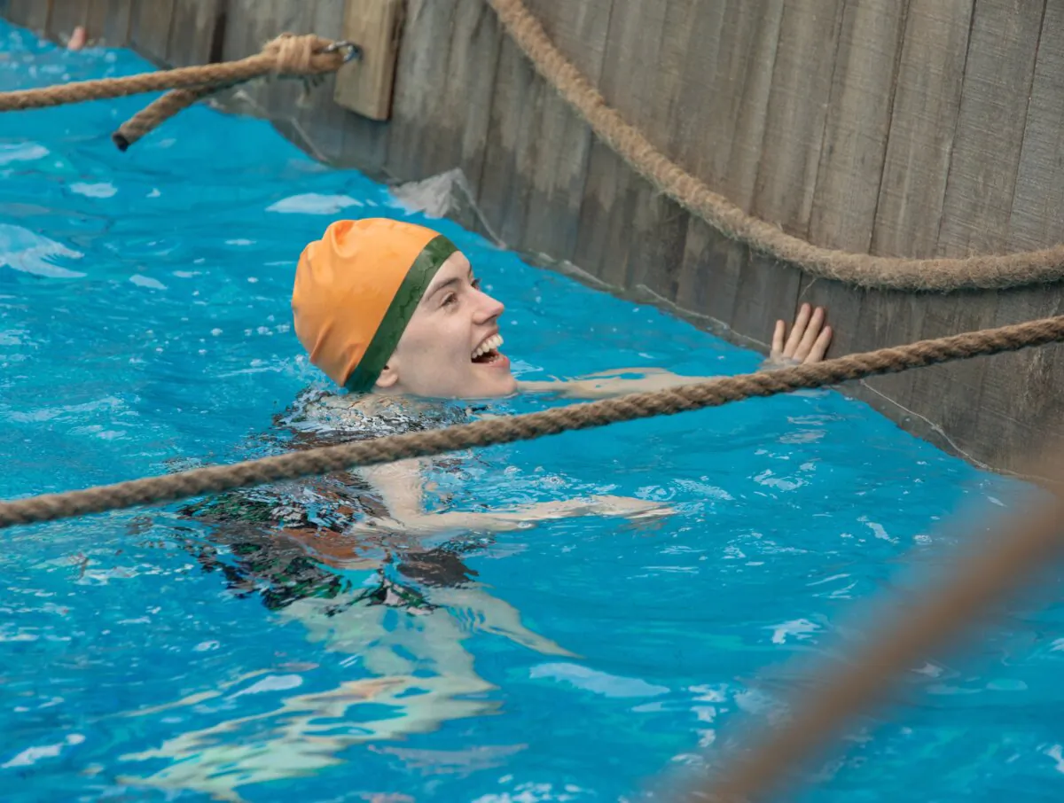 Publicity still for the 2024 film "Young Woman and the Sea," starring Daisy Ridley. (MovieStillsDB)
