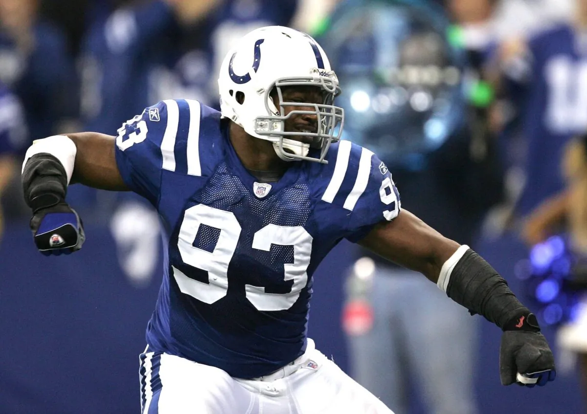 Dwight Freeney #93 of the Indianapolis Colts celebrates a defensive play against the Kansas City Chiefs during their AFC Wild Card Playoff Game at RCA Dome in Indianapolis, Ind., on Jan. 6, 2007. (Jonathan Daniel/Getty Images)