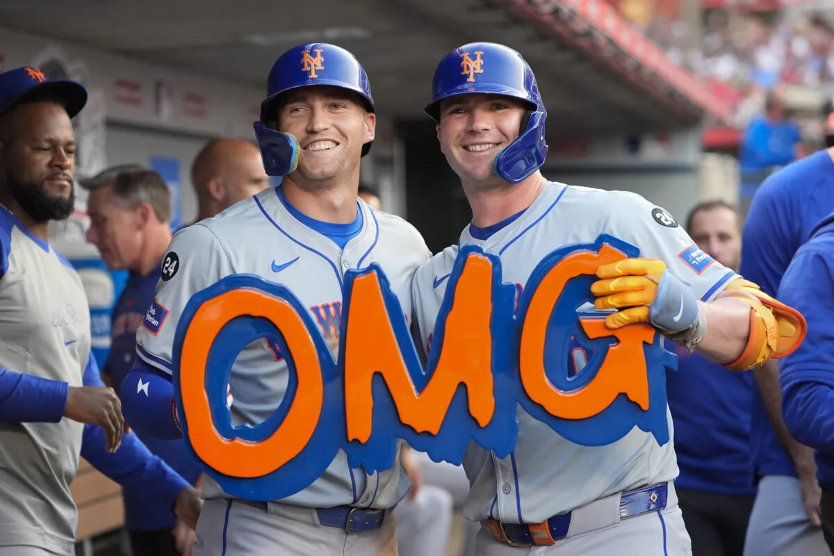 New York Mets' Pete Alonso, right, celebrates his two-run home run with Brandon Nimmo, who also scored, during the third inning of a baseball game against the Los Angeles Angels in Anaheim, Calif., on Aug. 2, 2024. (Ryan Sun/AP Photo)