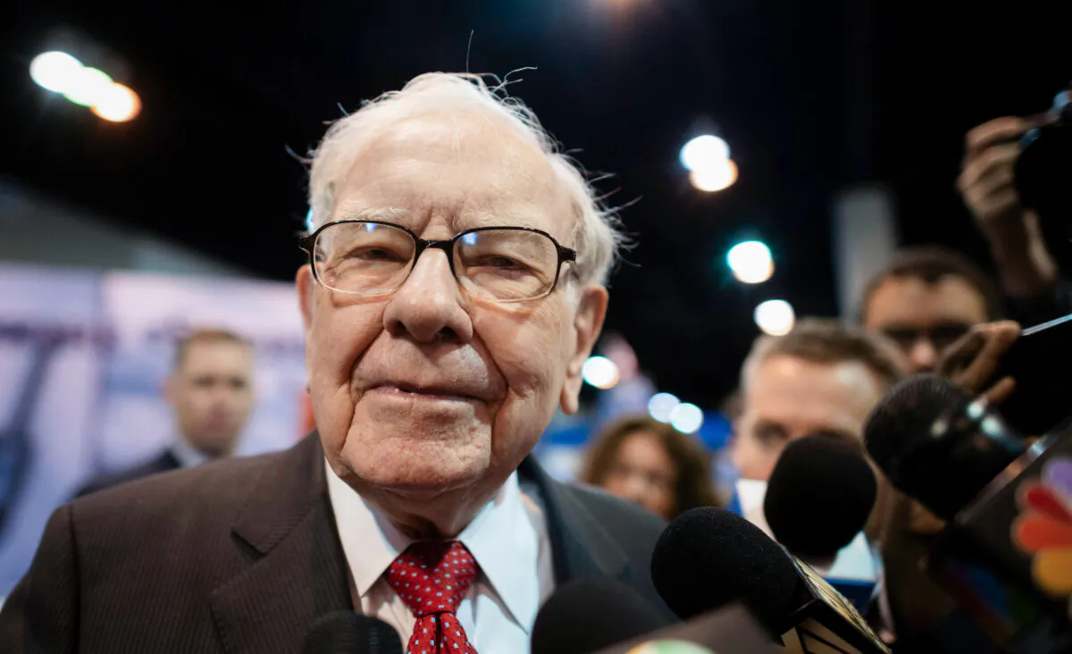 Warren Buffett (C), CEO of Berkshire Hathaway, speaks to the press as he arrives at the 2019 annual shareholders meeting in Omaha, Nebraska, May 4, 2019. (Johannes Eisele/AFP via Getty Images)