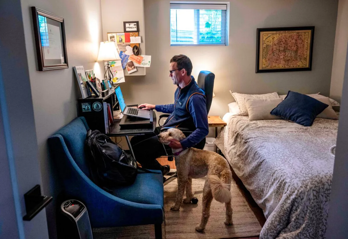 A man works from home in Arlington, Va., on May 25, 2023. (Andrew Caballero-Reynolds/AFP via Getty Images)