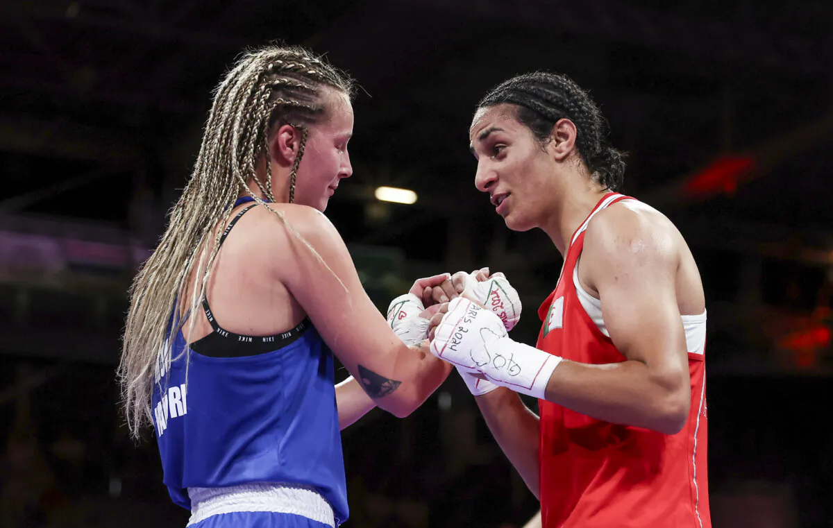 Imane Khelif (R) of Team Algeria interacts with Anna Luca Hamori of Team Hungary after the Women's 66kg quarter-final round match on day 8 of the Olympic Games Paris 2024 at North Paris Arena in Paris, France, on Aug. 3, 2024. (Richard Pelham/Getty Images)