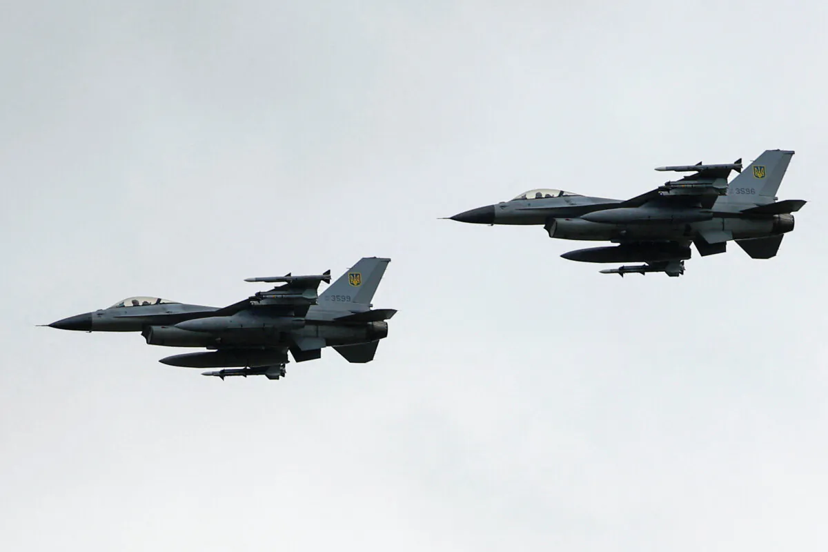 Ukrainian F-16 fighters at an undisclosed location in Ukraine on Aug. 4, 2024. (Valentyn Ogirenko/Reuters)