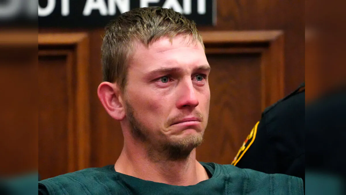 Chad Doerman sheds a tear as he stands just inside the Clermont County Municipal courtroom for his bond hearing, in Batavia, Ohio, on June 16, 2023. (Liz Dufour/The Cincinnati Enquirer via AP)
