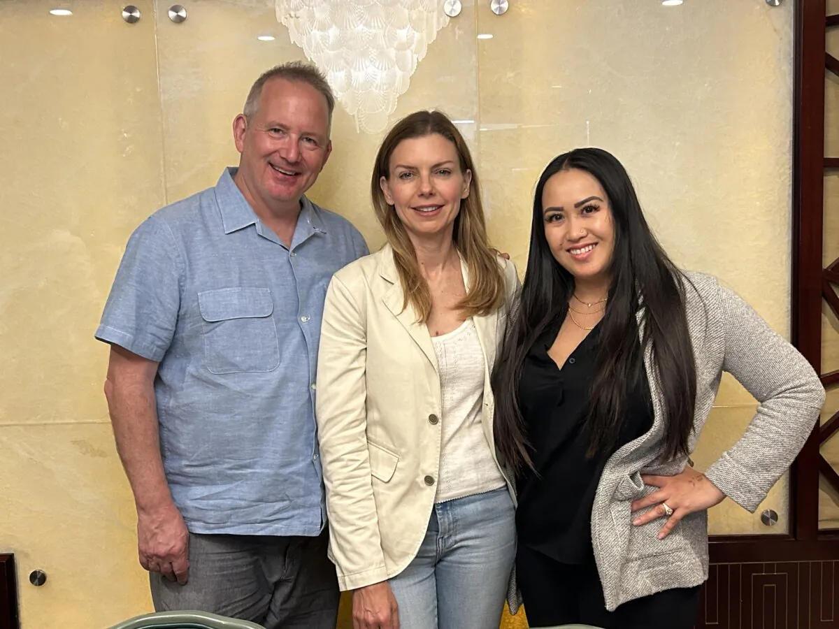 Movie director Vanessa Hope (center), producer Ted Hope (left), and producer Cassandra Jabola (right) at a press event for their documentary film "Invisible Nation" in San Francisco, Calif., on Aug. 2, 2024. (Nathan Su/The Epoch Times)