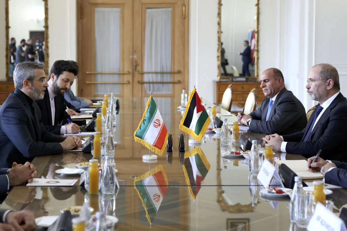 Iran's acting foreign minister Ali Bagheri (L) meets with his Jordanian counterpart Ayman Safadi (R) in Tehran, Iran, on Aug. 4, 2024. (AFP via Getty Images)
