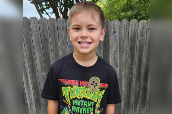 9-Year-Old Junior Officer Helps Unlock Elderly Woman's Home by Entering Through Doggy Door