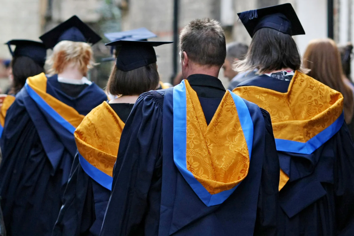 File photo of university graduates on Oct. 12, 2011. (Chris Radburn/PA)