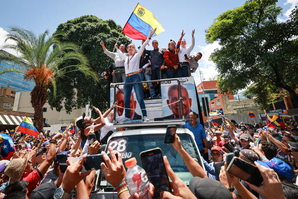 Opposition leader Maria Corina Machado greets supporters during a protest in Caracas, Venezuela, on Aug. 3, 2024. (Jesus Vargas/Getty Images)