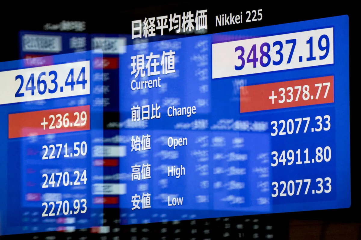An electronic quotation board displays share prices on the Tokyo Stock Exchange in Tokyo on Aug. 6, 2024. (Kazuhiro Nogi/AFP via Getty Images)