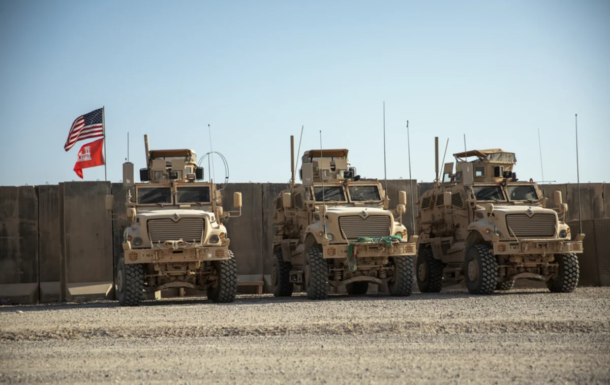 Three mine-resistant vehicles parked at Al Asad Air Base in northern Iraq on April 9, 2020. (U.S. Army photo by Spc. Derek Mustard)