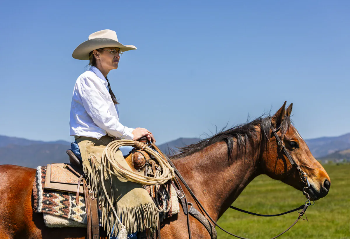 Theodora Johnson rides a horse on her ranch outside Yreka, Calif., on May 8, 2024. (John Fredricks/The Epoch Times)