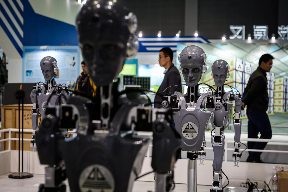Industrial robots are on display at a booth at the 2015 China International Industry Fair in Shanghai on Nov. 2, 2015. (Getty Images)