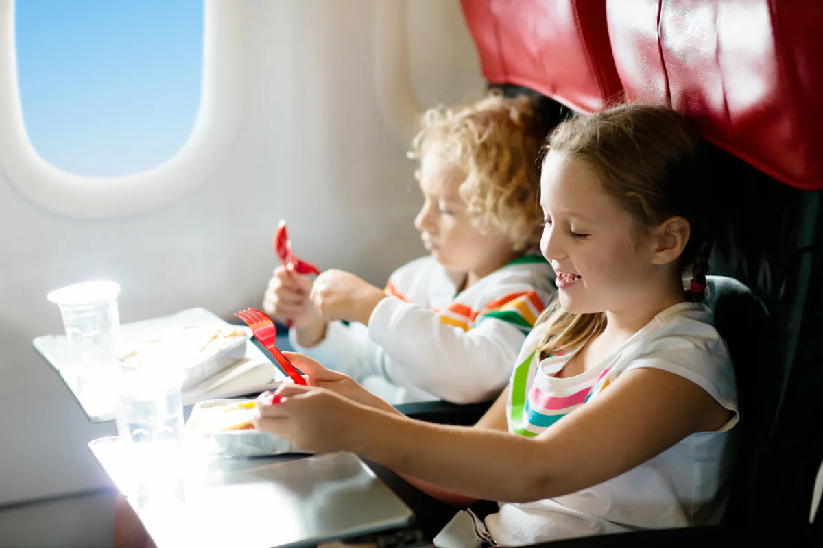 Children will be safer and more comfortable sitting with family members. (Dreamstime/TNS)