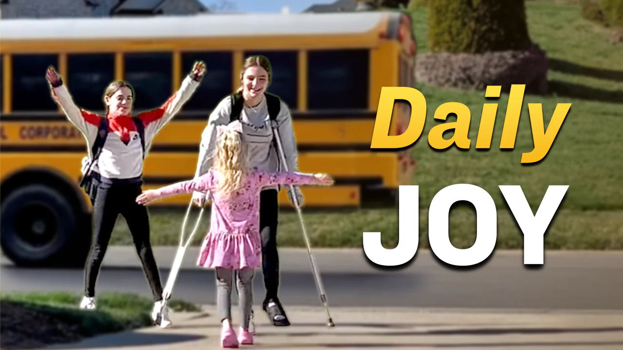 Little Girl Waits for Sisters to Get Off School Bus Every Day