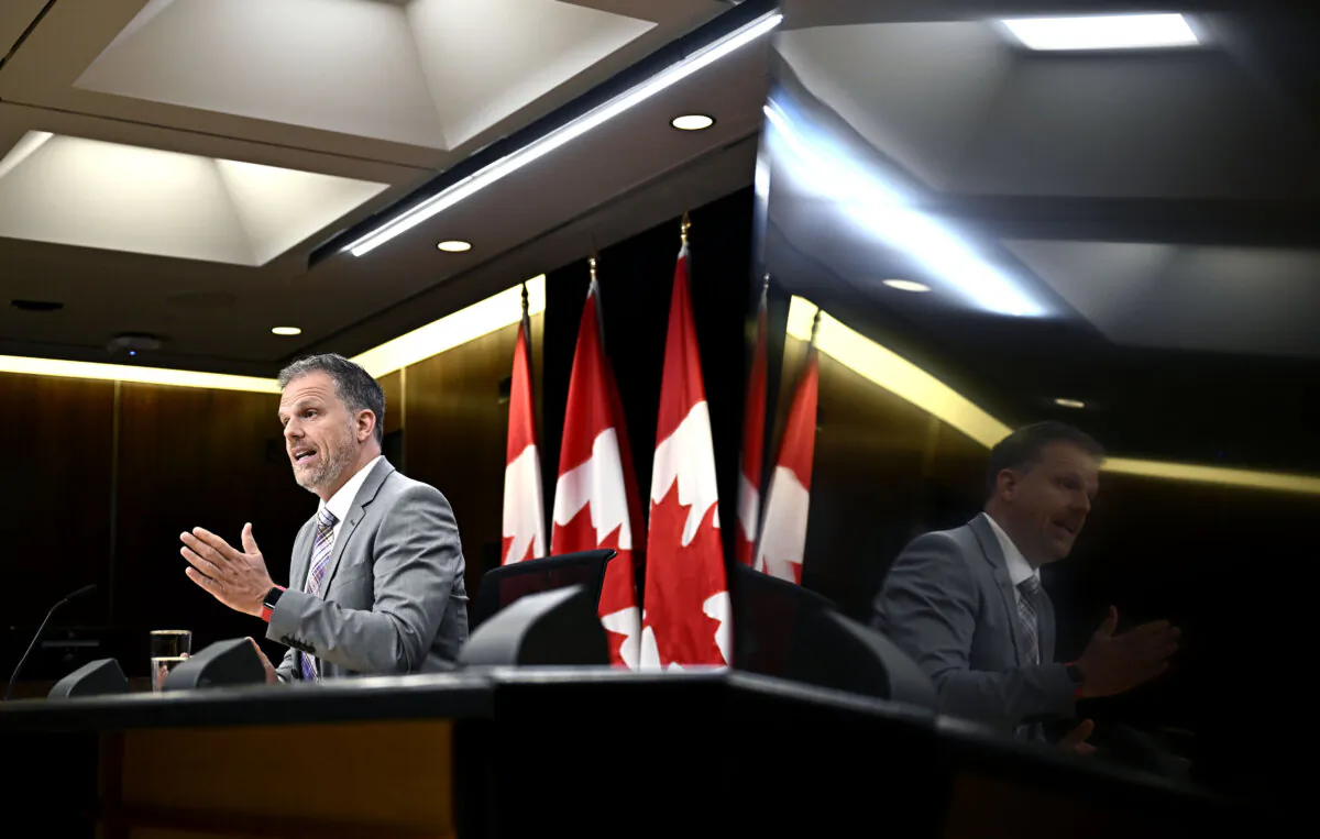 Minister of Health Mark Holland speaks at the National Press Theatre in Ottawa, on July 17, 2024. (The Canadian Press/Justin Tang)