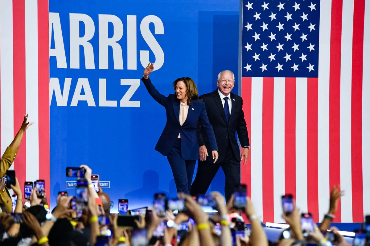 Democrat presidential candidate Vice President Kamala Harris and her running mate Minnesota Gov. Tim Walz greet supporters at Temple University's Liacouras Center in Philadelphia on Aug. 6, 2024. (Matthew Hatcher/AFP via Getty Images)
