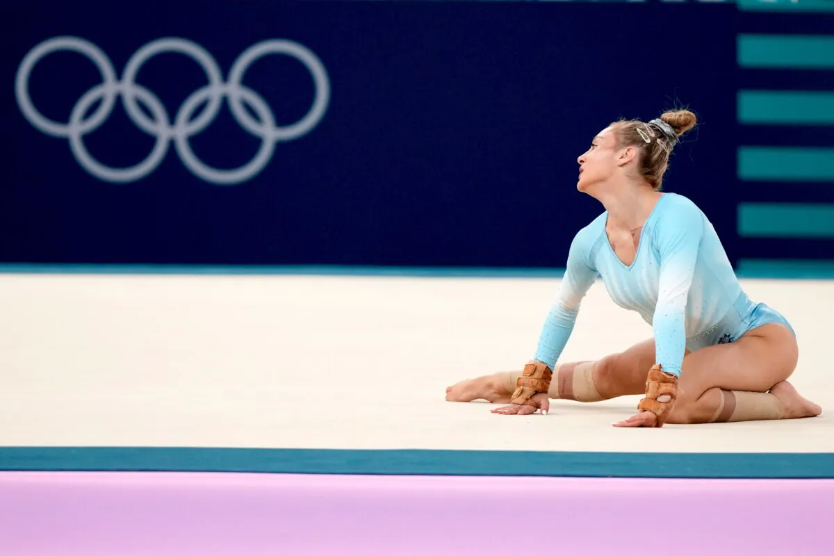 Sabrina Maneca-Voinea, of Romania, competes during the women's artistic gymnastics individual floor finals at Bercy Arena at the 2024 Summer Olympics in Paris, France, on Aug. 5, 2024. (Francisco Seco/AP Photo)