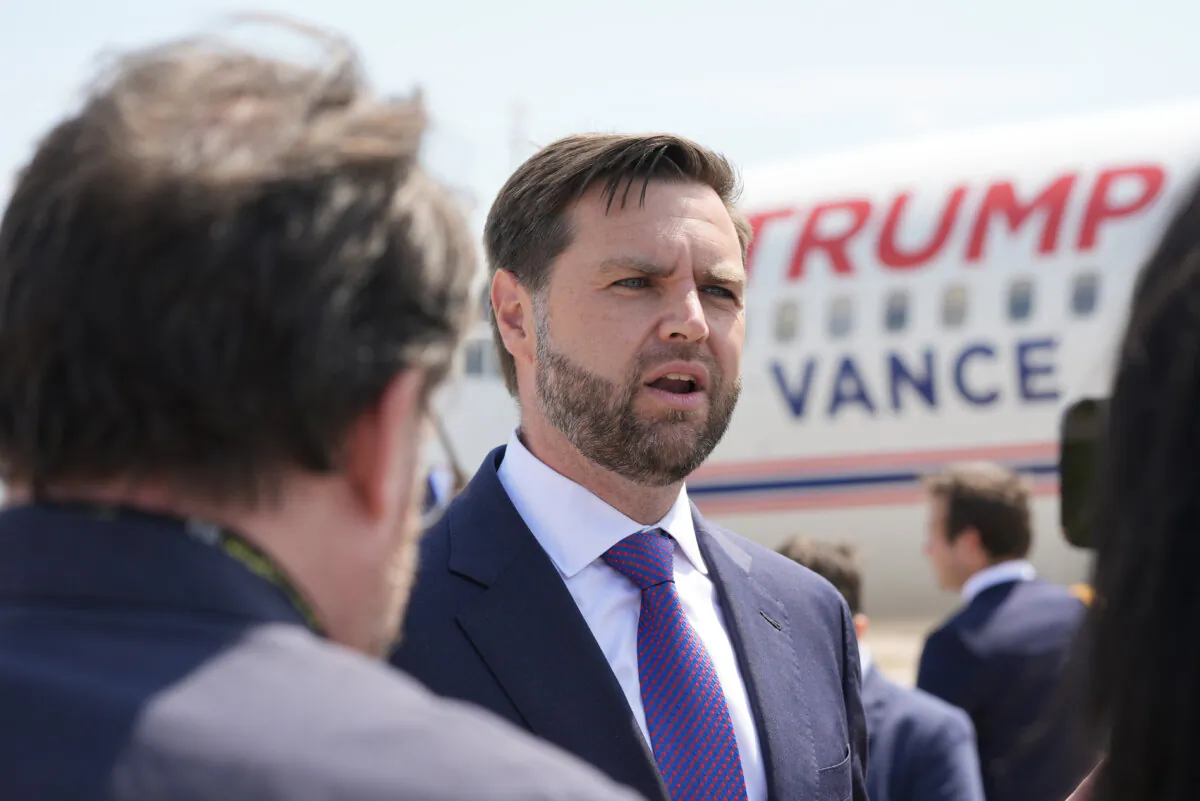 Republican vice presidential nominee Sen. JD Vance (R-Ohio) talks to reporters at Chippewa Valley Regional Airport in Eau Claire, Wis., on Aug. 7, 2024. (Alex Brandon/AP Photo)
