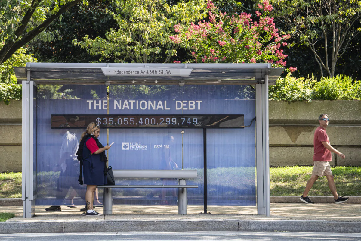 The national debt clock at a bus station in Washington on Aug. 6, 2024. (Madalina Vasiliu/The Epoch Times)