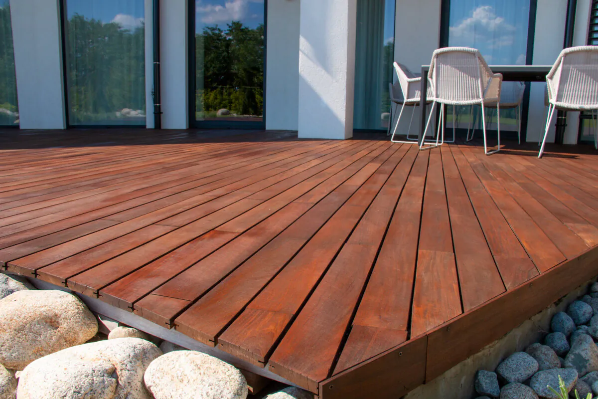 A stained deck will need a penetrative sealer to keep it looking pristine for as long as possible. (Radoslav Cajkovic/Shutterstock)