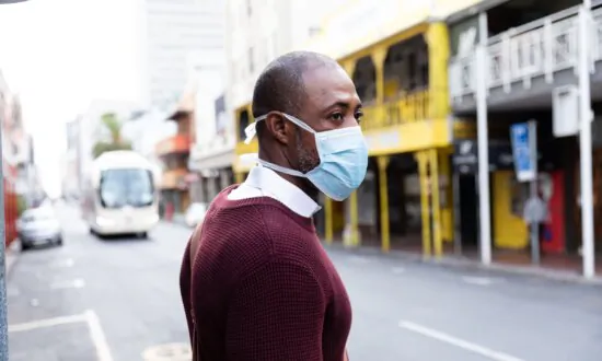 What Exactly Are You Inhaling When You Wear a Face Mask?