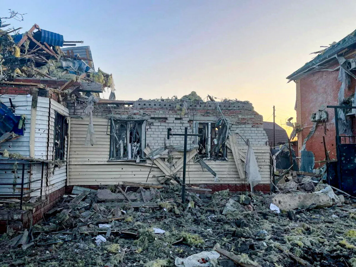 A damaged house following what local authorities called a Ukrainian military strike in the town of Sudzha in the Kursk Region, Russia, in this image released on Aug. 6, 2024. (Acting Governor of Kursk Region Alexei Smirnov via Telegram/Reuters)