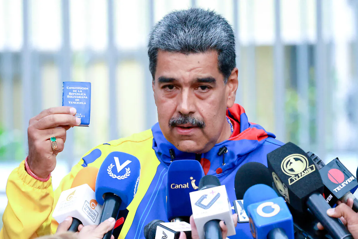 Venezuelan President Nicolás Maduro speaks during a press conference after casting his vote during the presidential elections at Escuela Ecológica Bolivariana Simón Rodríguez in Fuerte Tiuna, Caracas, Venezuela, on July 28, 2024. (Jesus Vargas/Getty Images)