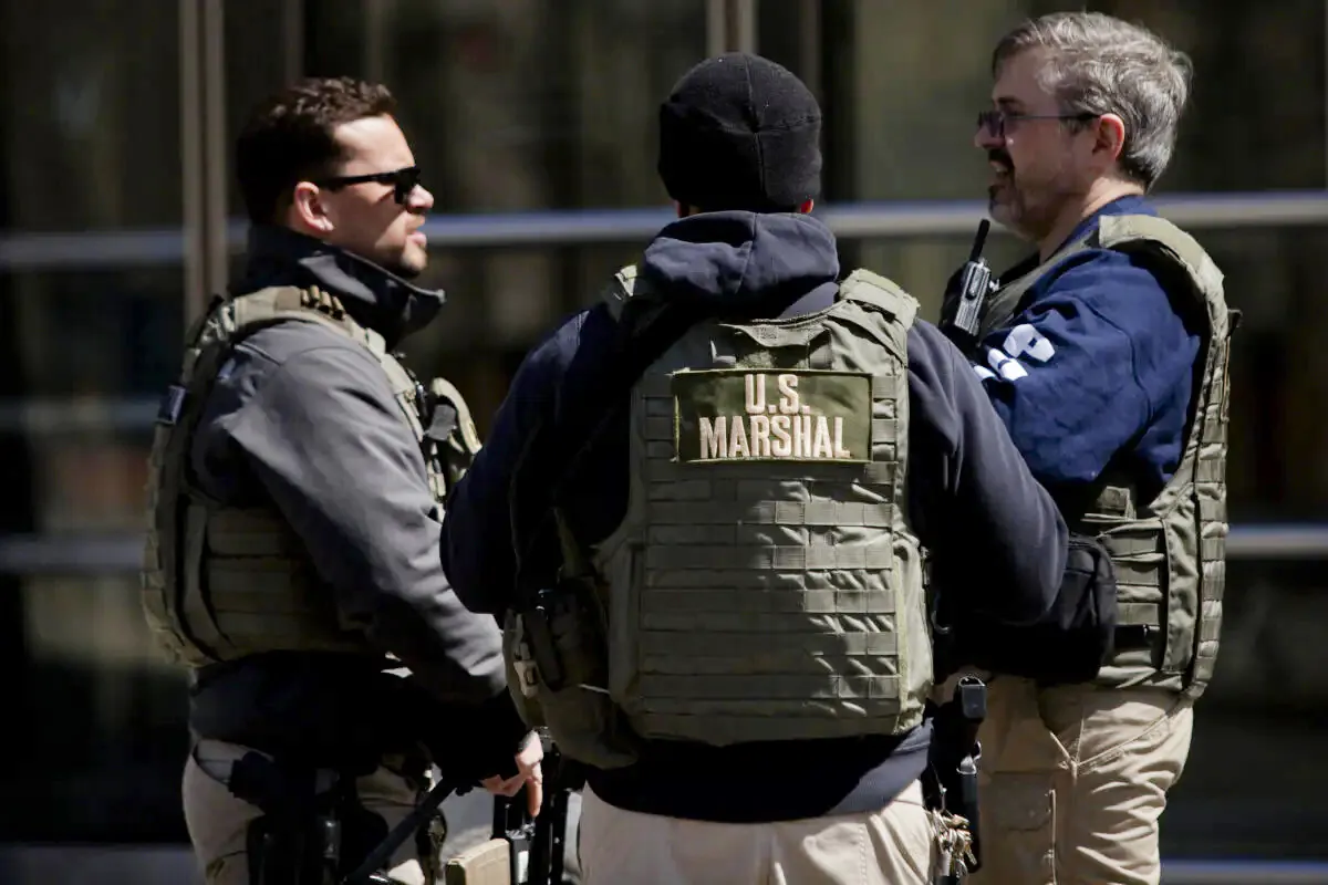 File photo showing members of the U.S. Marshals Service monitoring an area in New York City, on April 2, 2015. (Victor J. Blue/Getty Images)