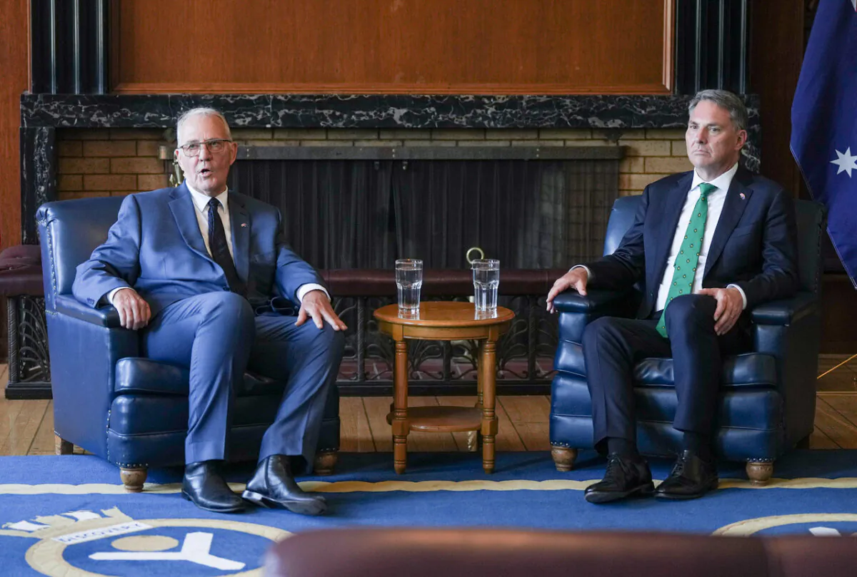 Canada's Minister of National Defence Bill Blair (L), and Australia's Deputy Prime Minister and Minister for Defence Richard Marles hold a meeting at HMCS Discovery, a Royal Canadian Navy Reserve division, in Vancouver on Aug. 8, 2024. (The Canadian Press/Darryl Dyck)